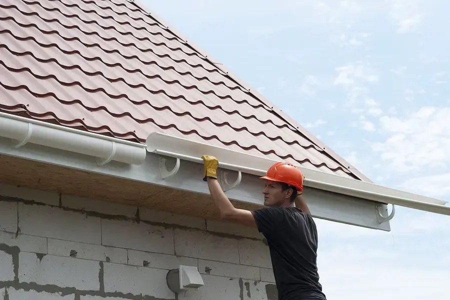 Gutter Installation work on a residential gutter system