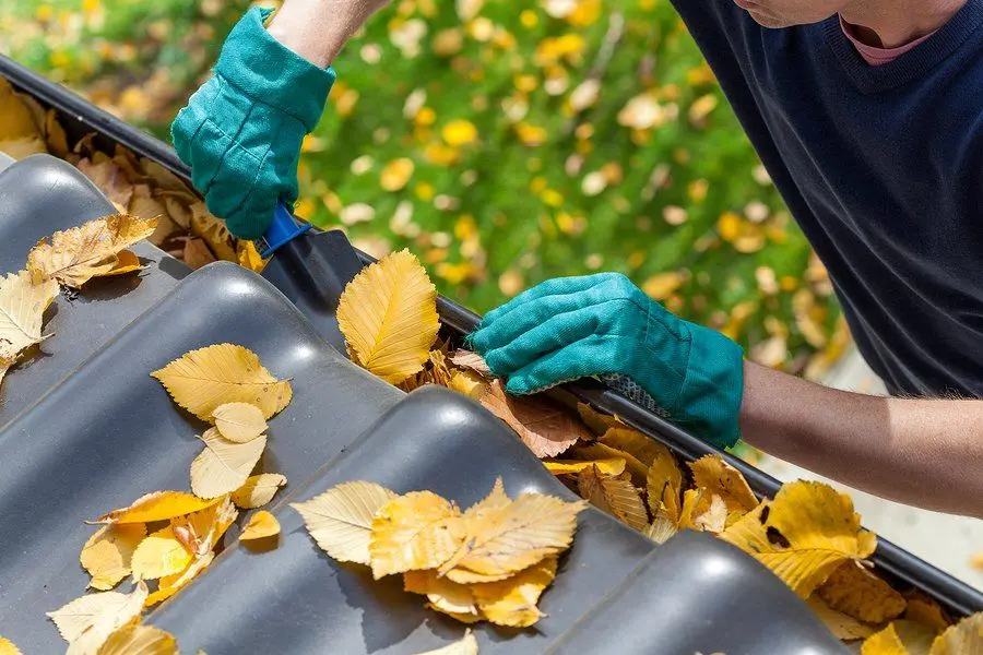 Checking the edge of a residential gutter system